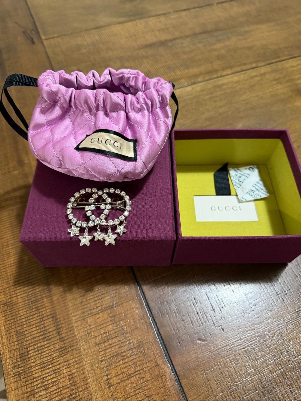 GUCCI Pink Quilted Pouch with Crystal Star Brooch
